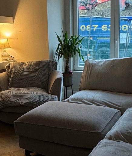 Comfortable sitting area at Kellsbeauty, County Kildare, IE, featuring plush seating and ambient lighting.