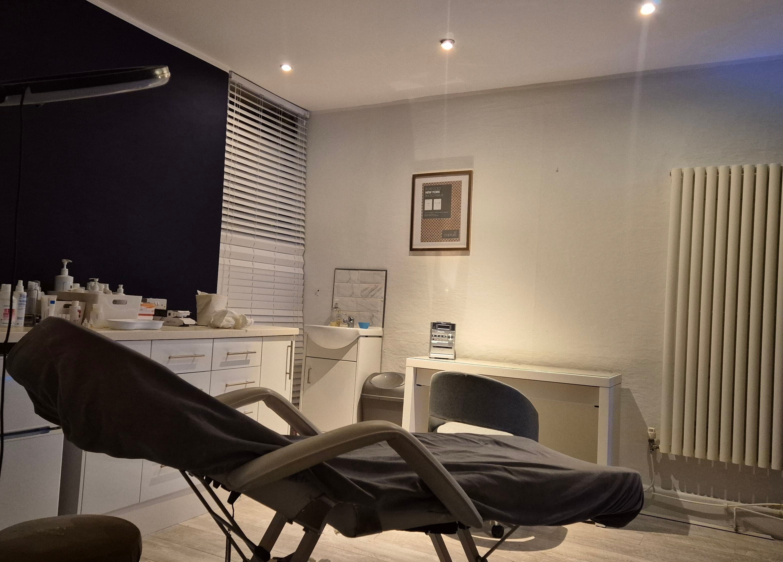 Peaceful treatment room at NatieeBeauty in Blackpool, England, GB with a comfortable chair and modern decor.