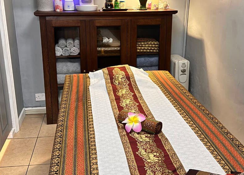Calm room in Trust Thai Massage Therapy in Boston, Lincolnshire, featuring elegant linens. Boston, England, GB.