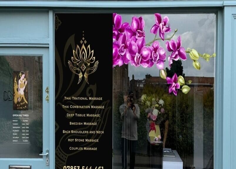Front of Trust Thai Massage Therapy in Boston, Lincolnshire, showcasing vibrant orchids in Boston, England, GB.