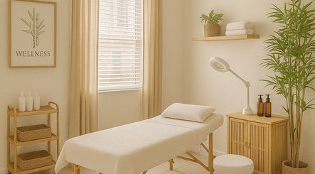 Tranquil therapy room at Lissem & Wellness in Homestead, Florida, US with massage bed and soft lighting.