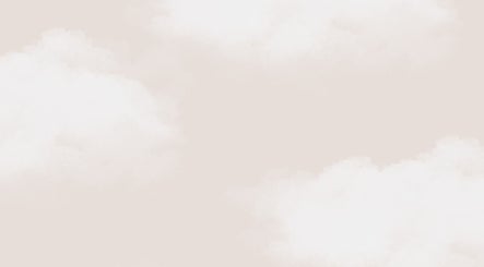 Soft, dreamy clouds over Cloud Nine Beauty in Tuam, County Galway, IE create a serene atmosphere.