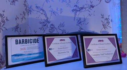 Certificates of excellence at Muse K Nails, showcasing beauty accomplishments in London, England, GB.