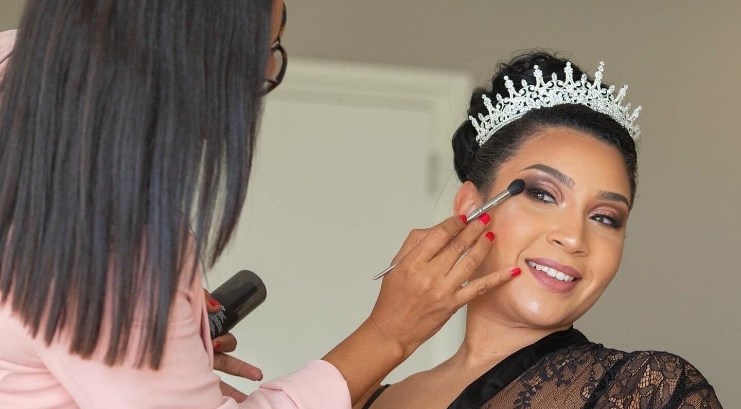 Makeup artist at Makeupbyjoselin in Kralendijk, Bonaire, BQ enhances client's look with a tiara and makeup.