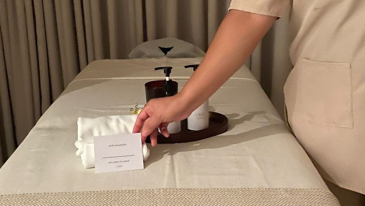 Massage table setup at Oria Spa Home Service, Riyadh, Riyadh Province, SA, featuring towels and spa products.