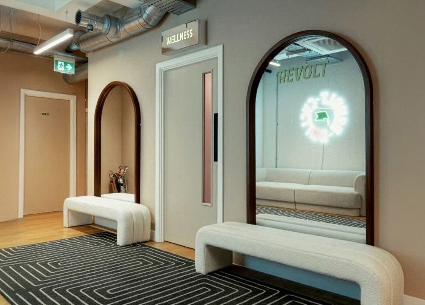 Chic wellness area at Revolt Cycling, with mirrors and seating in London, England, GB.