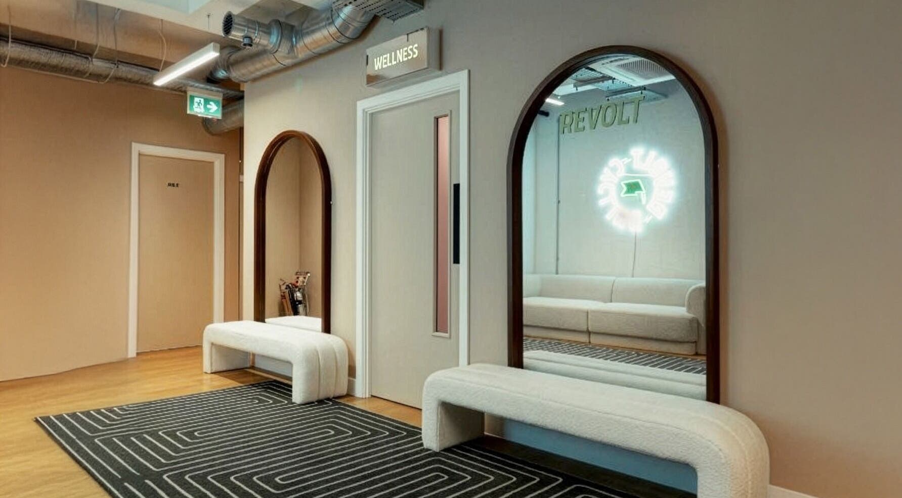 Chic wellness area at Revolt Cycling, with mirrors and seating in London, England, GB.