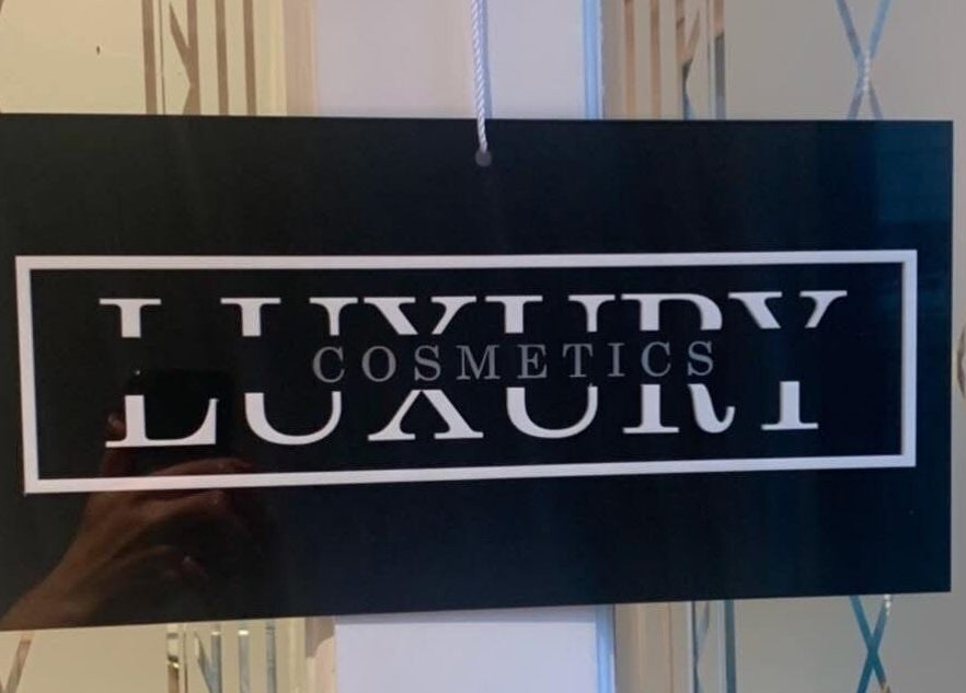 LuxuryCosmetics sign with elegant design at South Woodham Ferrers, England, GB.