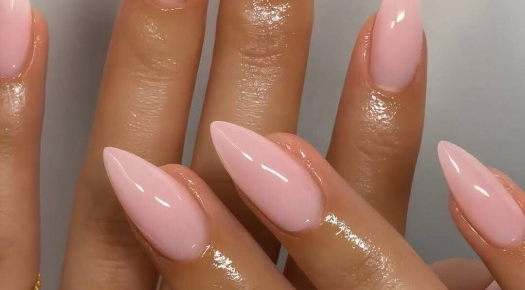 Elegant pink stiletto nails by Ari-Rose Beauty, Thetford, England, GB, showcasing glossy manicure art.