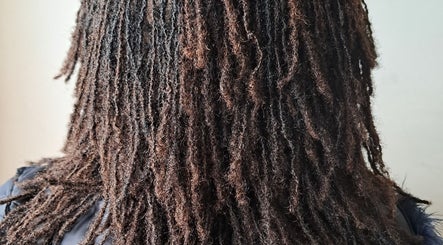 Dreadlocks hairstyle by Loctician en route in Cape Town, Western Cape, ZA, showcasing detailed texture.