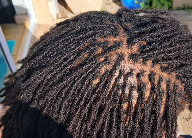 Close-up of intricate hair twists at Loctician en route, Cape Town, Western Cape, ZA.