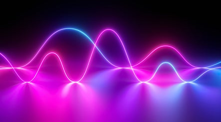 Vibrant neon waves symbolize Pulse Elite Winter Garden's lively atmosphere in Winter Garden, Florida, US.