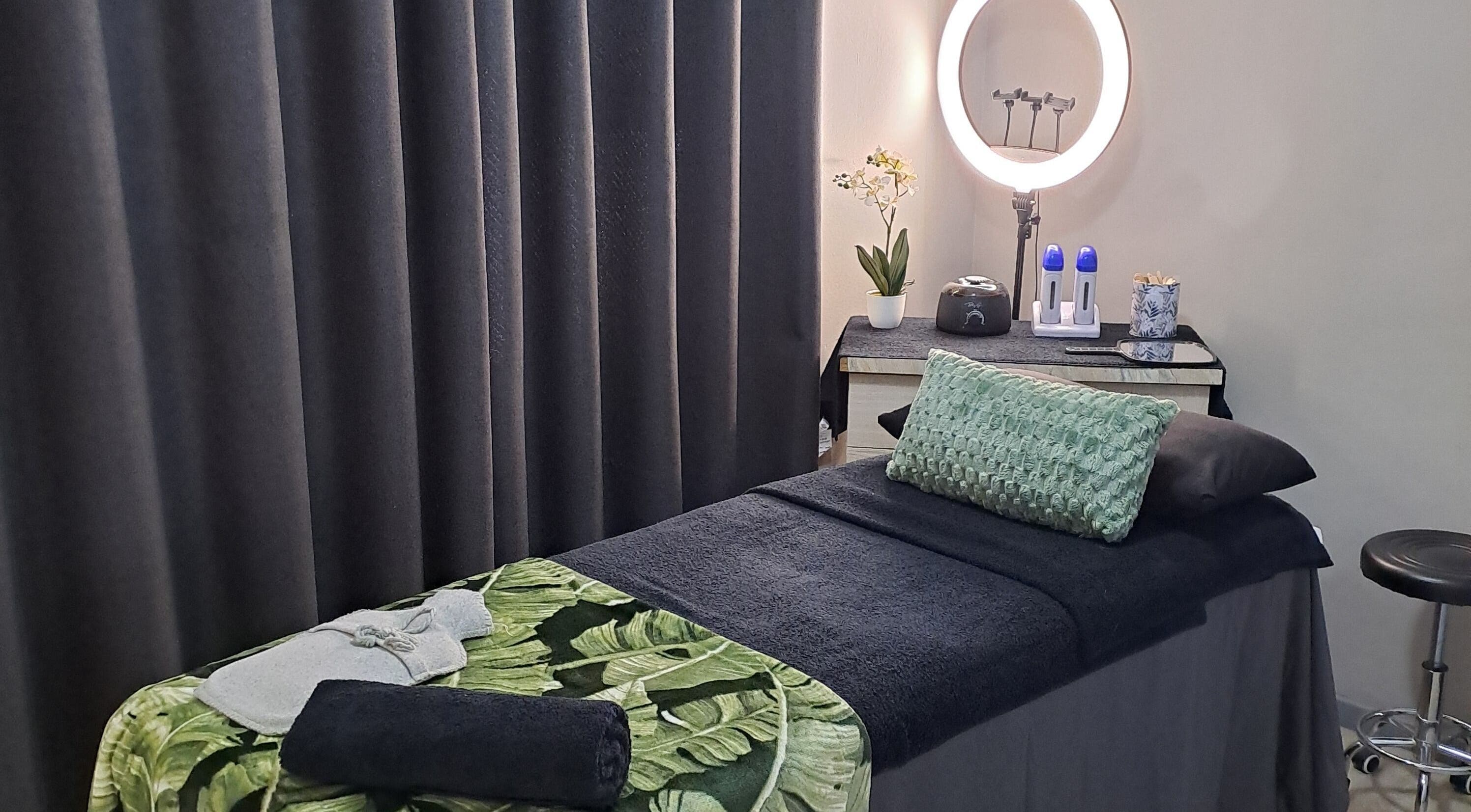 Relaxing treatment room at BeautyMe in Cape Town, Western Cape, ZA with soothing decor and soft lighting.