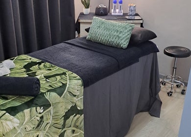 Cozy massage bed at BeautyMe in Cape Town, Western Cape, ZA, ready for relaxation and wellness therapy.