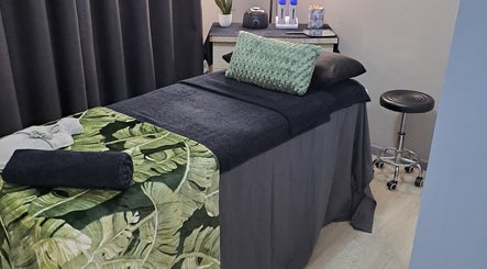 Cozy massage bed at BeautyMe in Cape Town, Western Cape, ZA, ready for relaxation and wellness therapy.