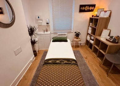 Peaceful massage room at Bexley Thai Massage, Bexley, England, GB, featuring a cozy table and soothing decor.