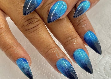 Stunning blue gradient nails by Nails By Fila in Durban, Kwazulu-natal, ZA. Glamorous and chic design.