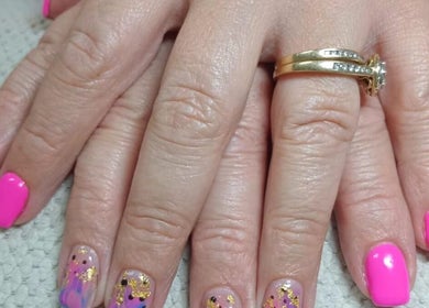 Bright pink nails with gold accents at Lallie Nail Studio, Potchefstroom, North West, ZA.
