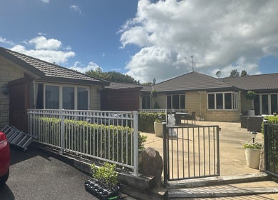 Modern facade of Lashed And Loaded, Horsham Downs, Waikato Region, NZ, featuring a welcoming outdoor area.