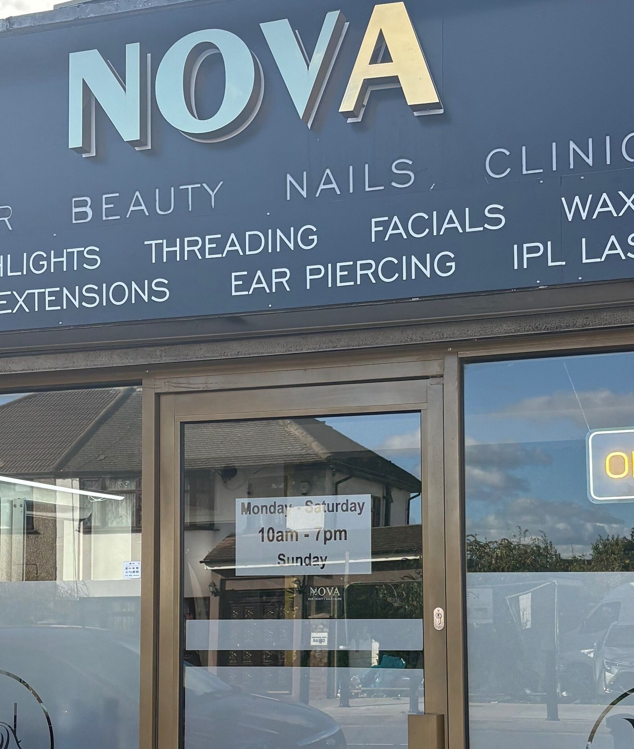 Stiletto Vault facade with beauty services listed, located in Wembley, England, GB.