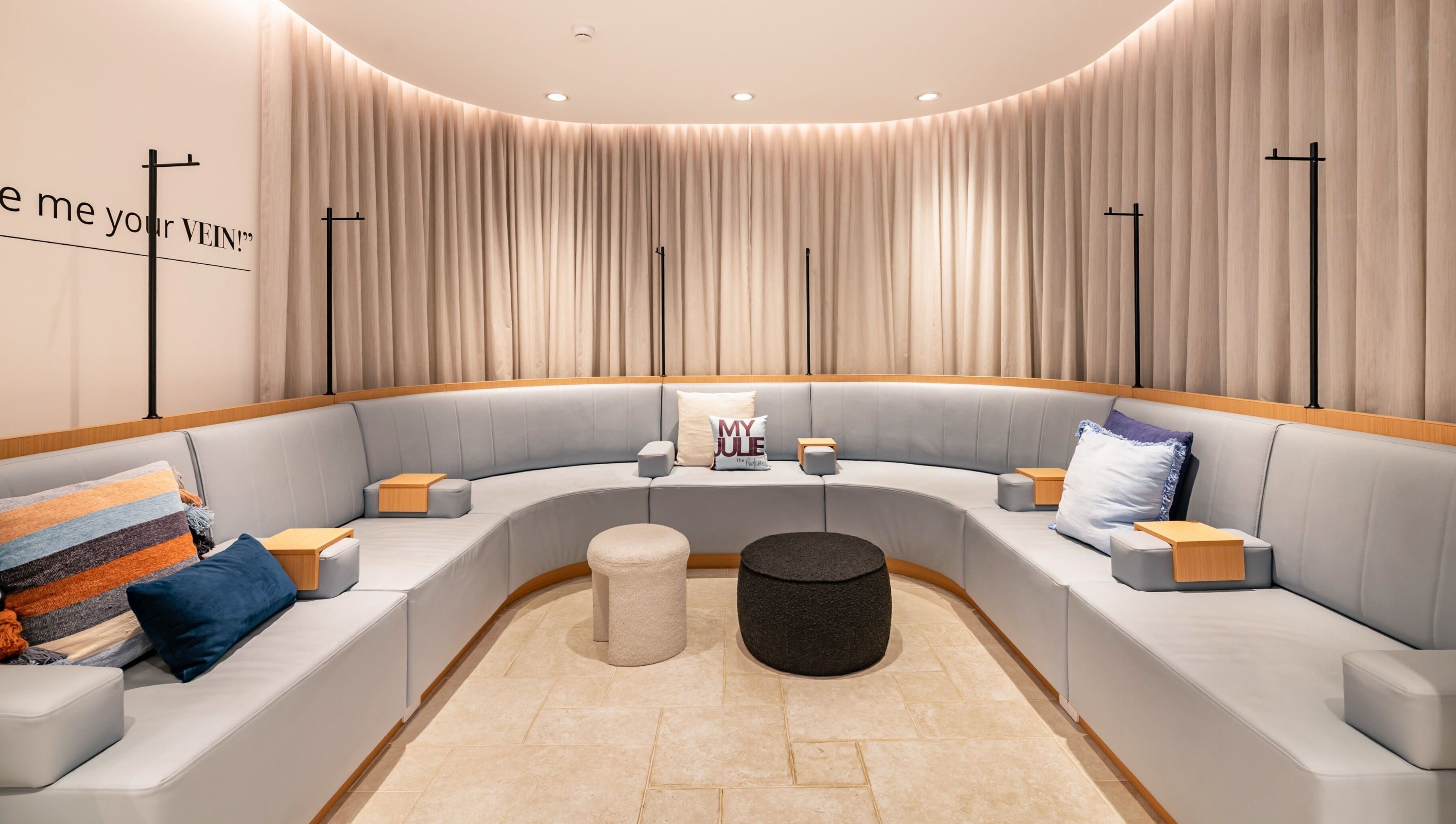 Cozy seating area at My Julie in Moonee Ponds, Victoria, AU with plush cushions and soft lighting.