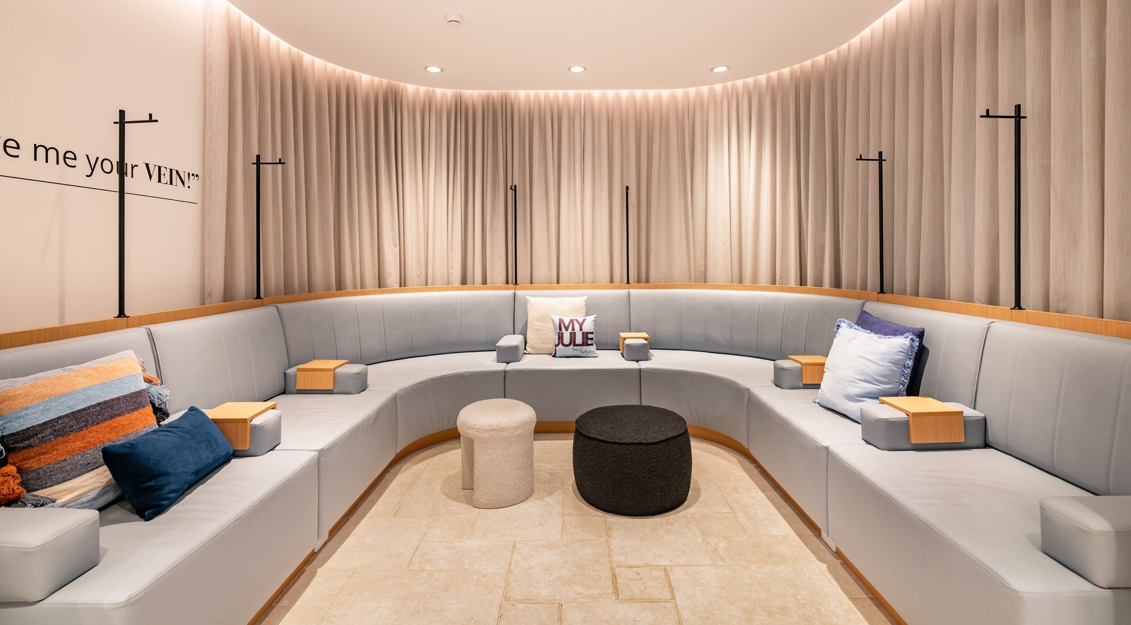 Cozy seating area at My Julie in Moonee Ponds, Victoria, AU with plush cushions and soft lighting.