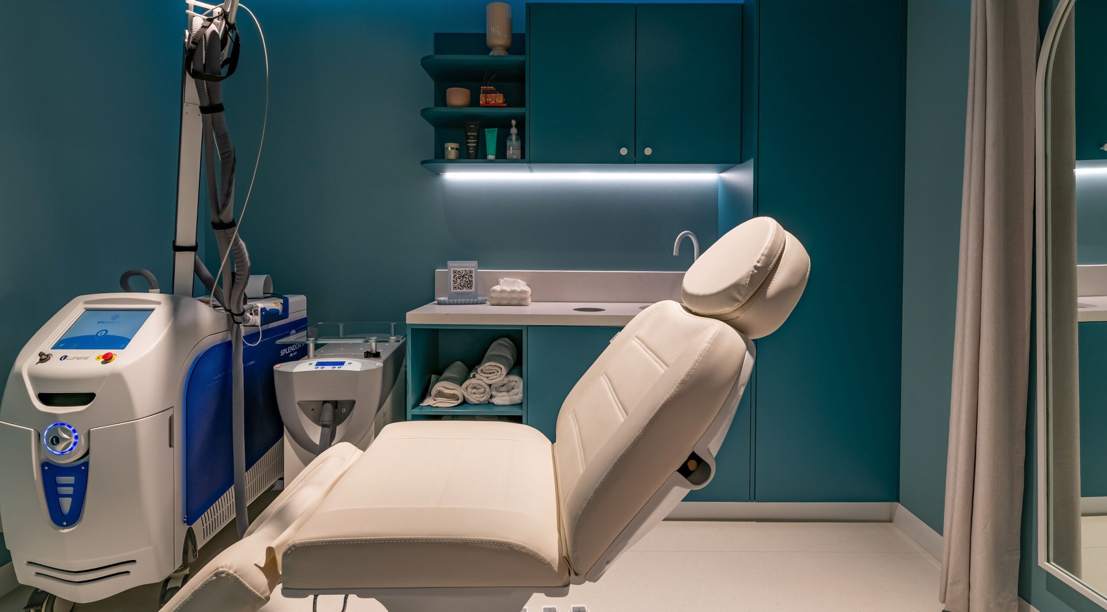 Modern treatment room at My Julie, Moonee Ponds, Victoria, AU, featuring sleek equipment and calming decor.