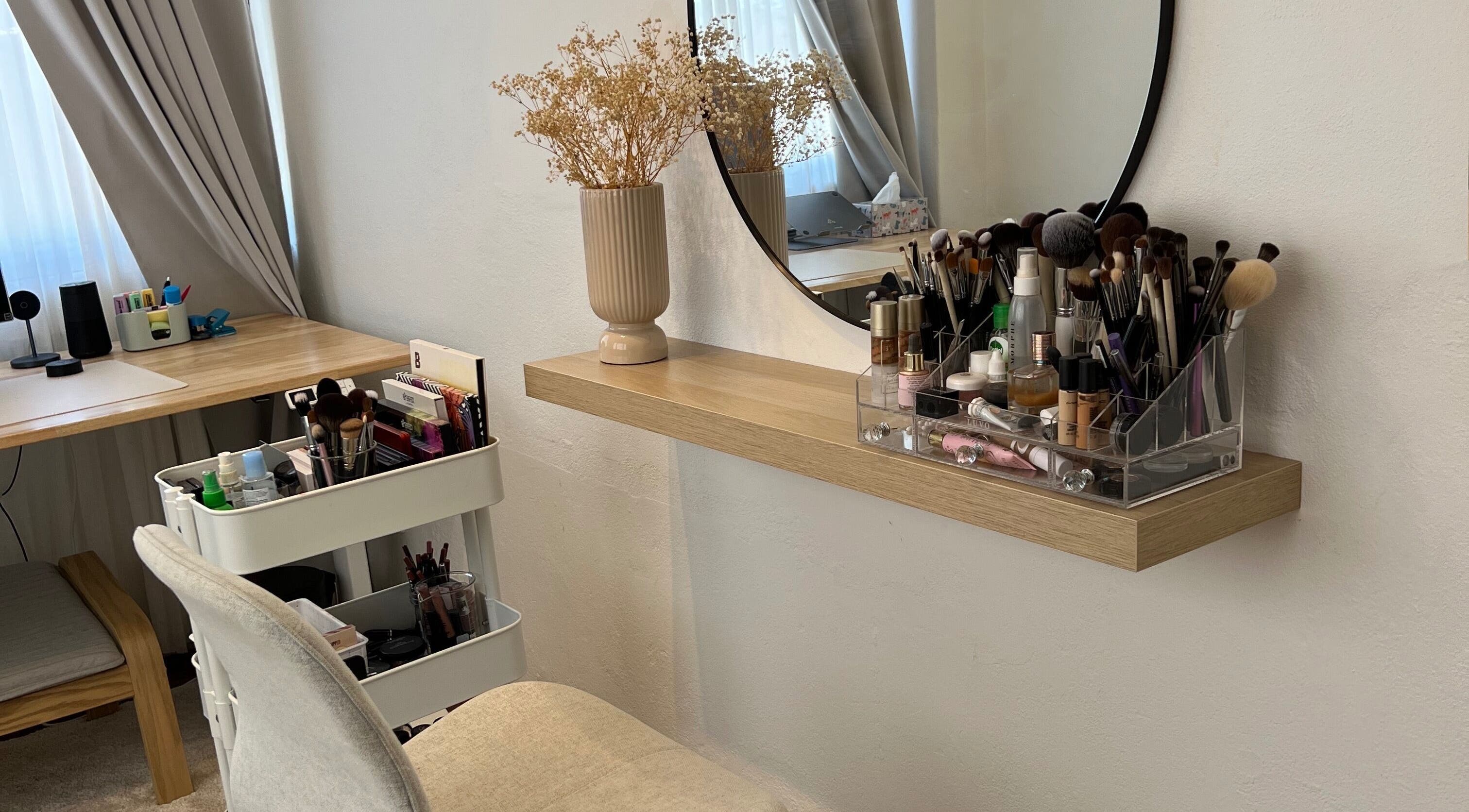 Makeup station at DANNI MAKEUP ARTIST, Saint James, Western Australia, AU featuring elegant decor and tools.
