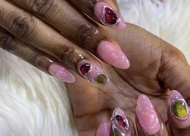 Intricate gel nail art at Omosi Nails Studio, Lagos, Lagos, NG showcasing creative nail designs.
