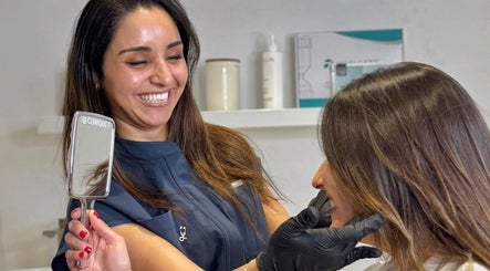 A client enjoys a consultation at Dr Imen Azabou's clinic in Montréal, Québec, CA.