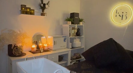 Calming interior of KB Skin & Beauty Salon in Melbourne, Victoria, AU with warm lighting and candles.