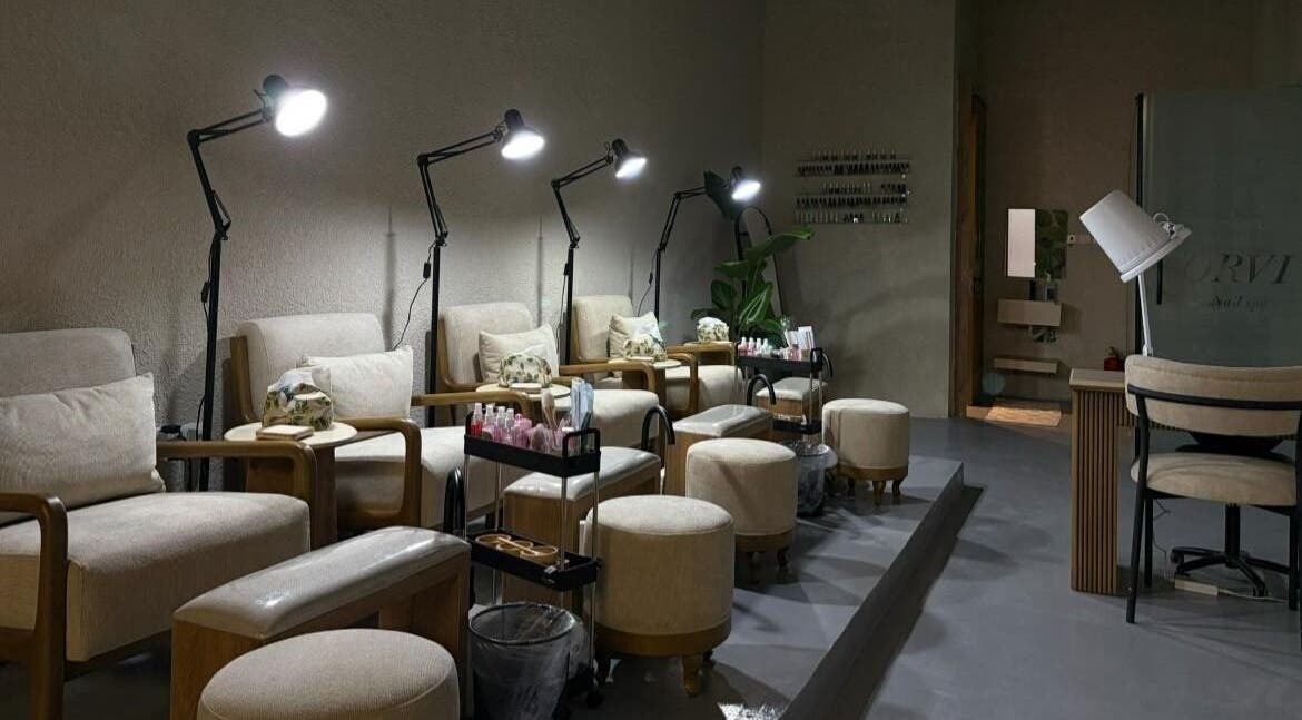 Relaxing nail care setup at Orvi Nail Spa, Riyadh, Riyadh Province, SA, with cozy seating and ambient lighting.