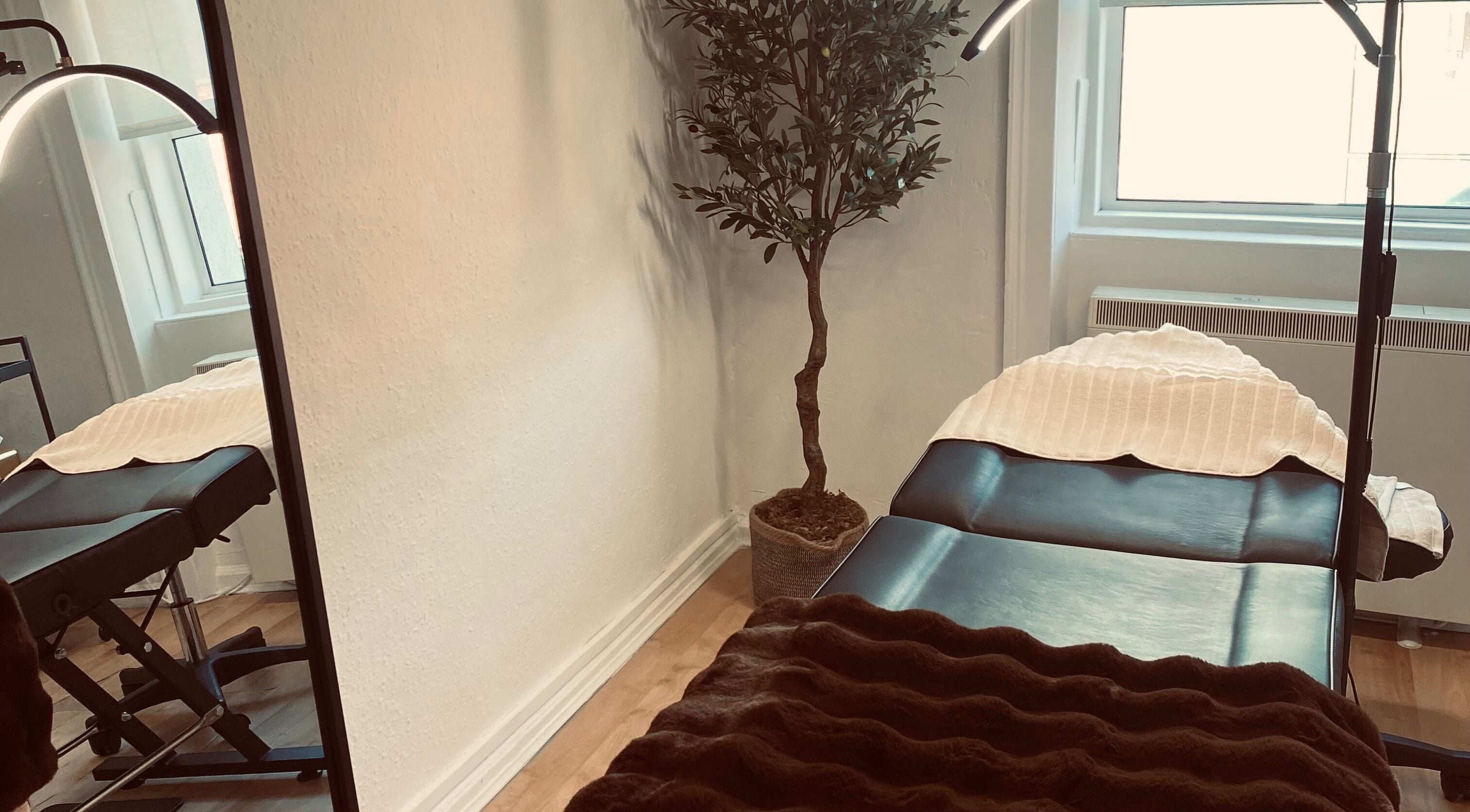 Relaxing spa treatment room at AETHER Luxury Skin, Dublin, County Dublin, IE designed for peace and comfort.