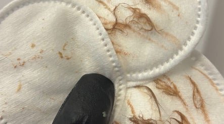 Close-up of used cotton pads with makeup residue at CL BEAUTY LOUNGE, Newcastle upon Tyne, England, GB.
