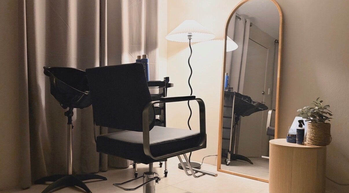 Elegant styling chair and mirror at Haus of Nano, Sydney, New South Wales, AU.