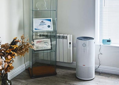 Elegant corner decor at The Brow Rehab, Little Lever, England, GB, featuring certificates and a modern purifier.