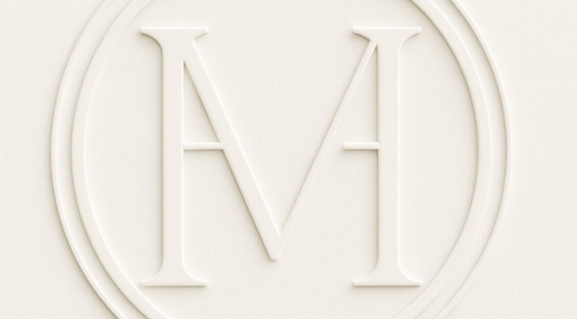 Embossed logo of Maison De Hannah, Norwest, New South Wales, AU, showcasing an elegant 'M' symbol.