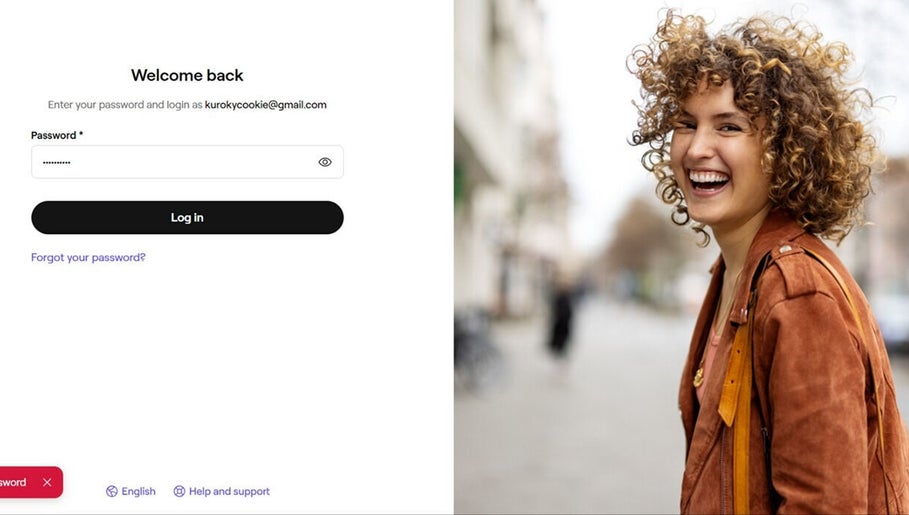 Smiling person with curly hair near Fvcndo Barbershop, Angeles, Central Luzon, PH login page.