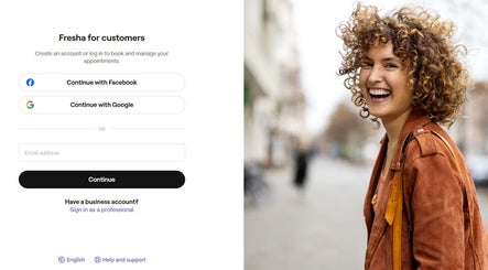 Smiling customer at Fvcndo Barbershop, Angeles, Central Luzon, PH with login options.