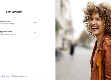 Smiling person in Fvcndo Barbershop, Angeles, Central Luzon, PH highlighting vibrant customer experience.