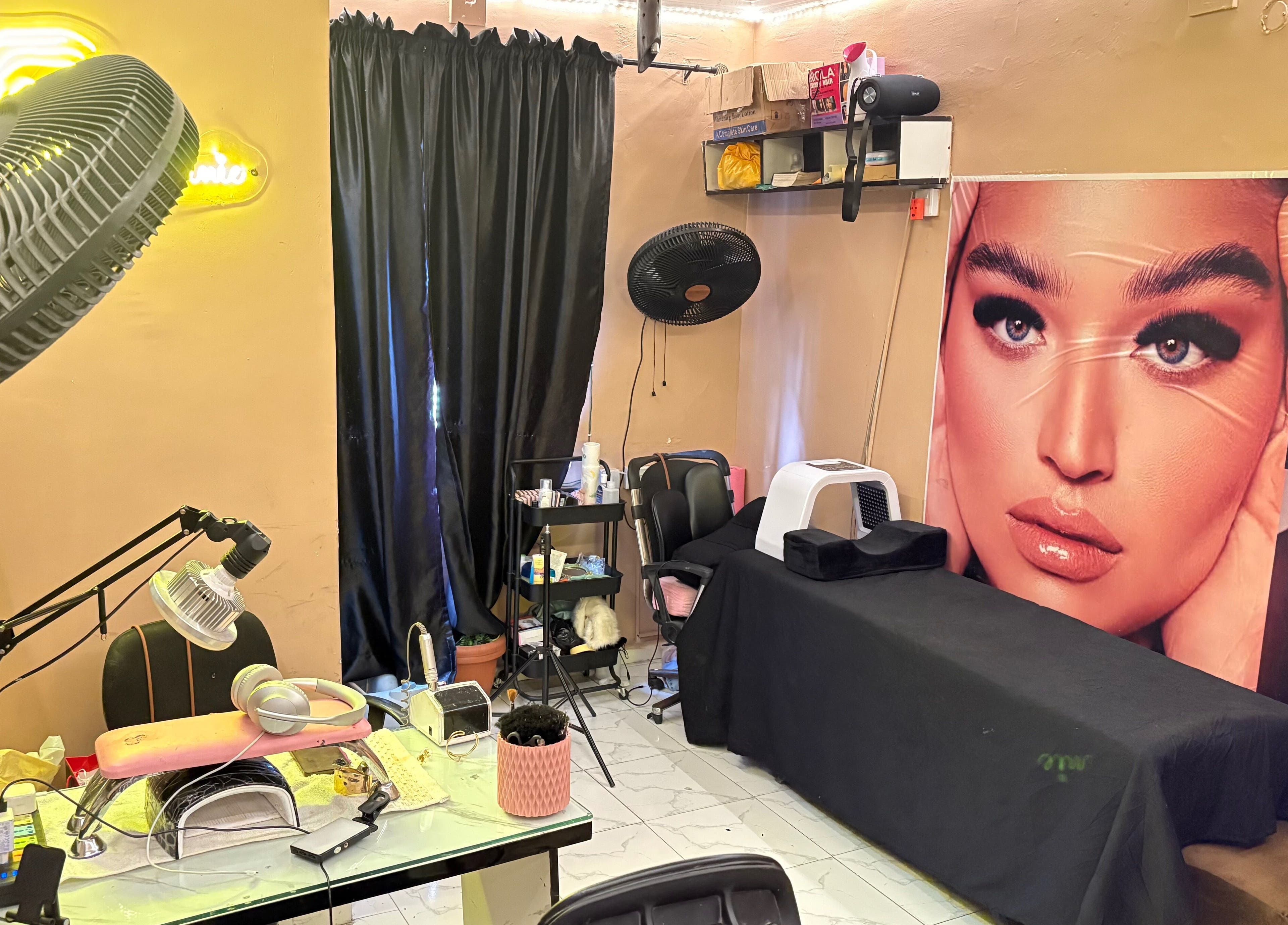 Modern beauty setup at Nailed by Ronnie in Ikeja, Lagos, NG featuring nail and eyelash stations.