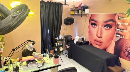 Modern beauty setup at Nailed by Ronnie in Ikeja, Lagos, NG featuring nail and eyelash stations.