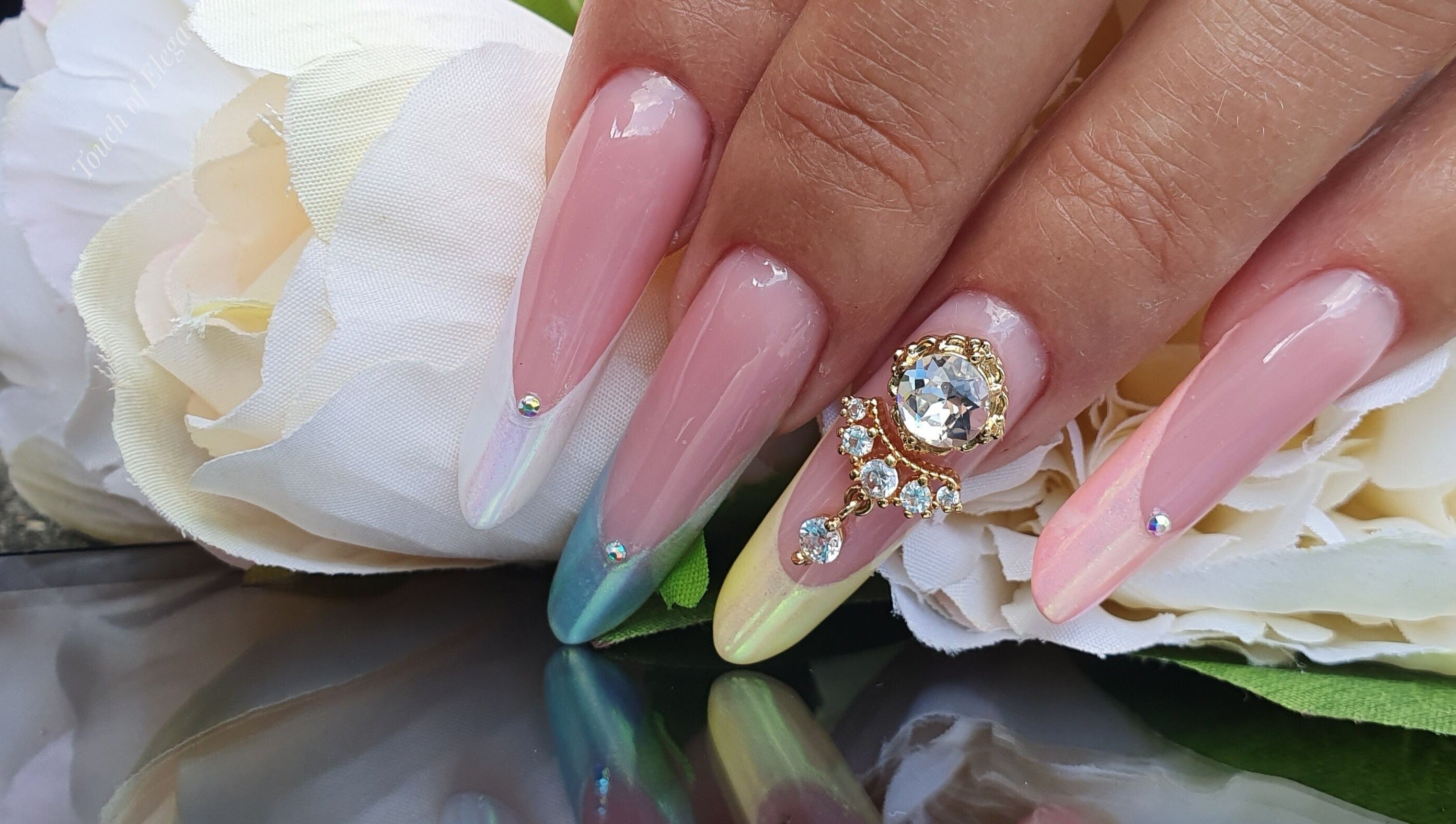 Exquisite nail art with crystals at Touch of Elegance, Colchester, England, GB. Perfect for a sophisticated look.