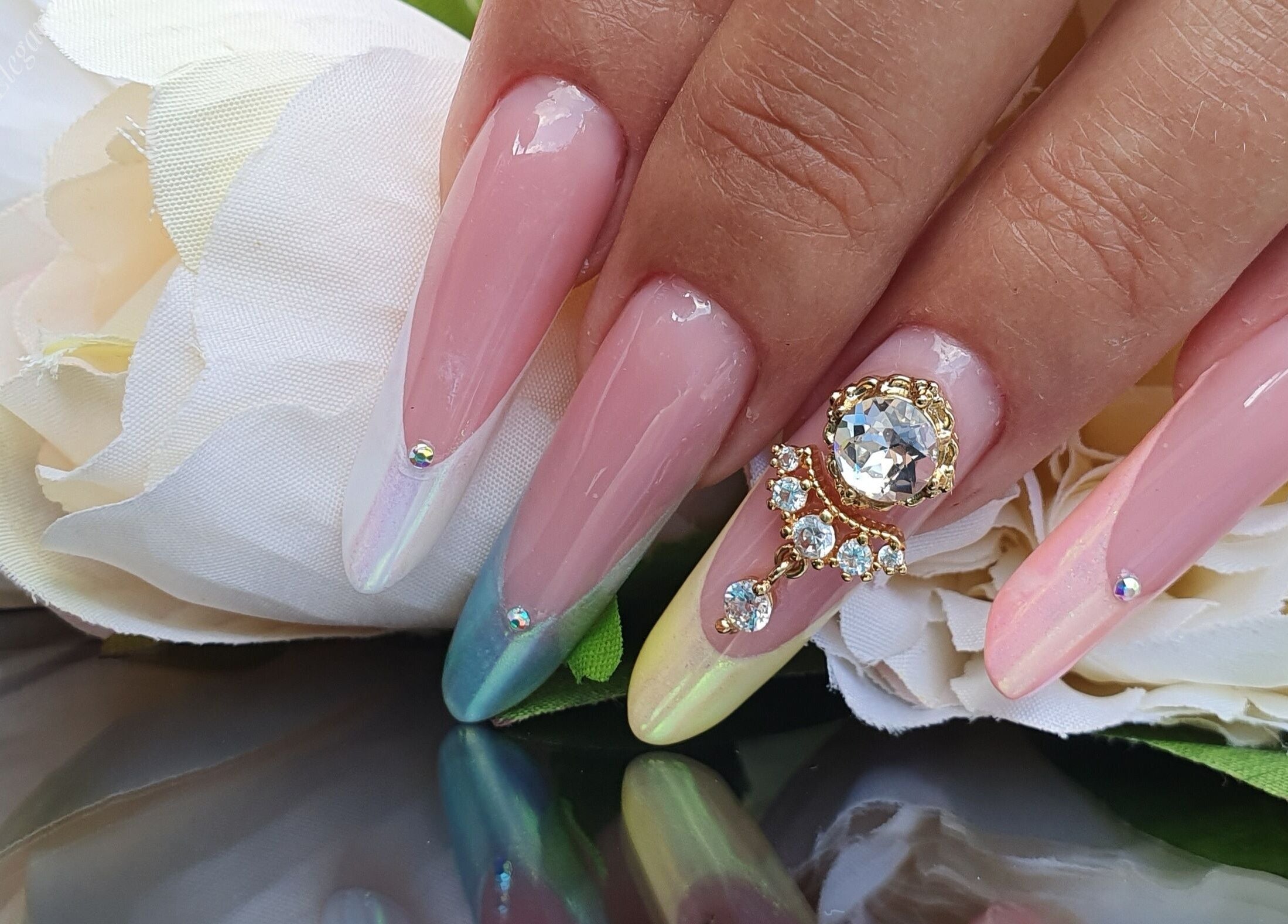 Exquisite nail art with crystals at Touch of Elegance, Colchester, England, GB. Perfect for a sophisticated look.