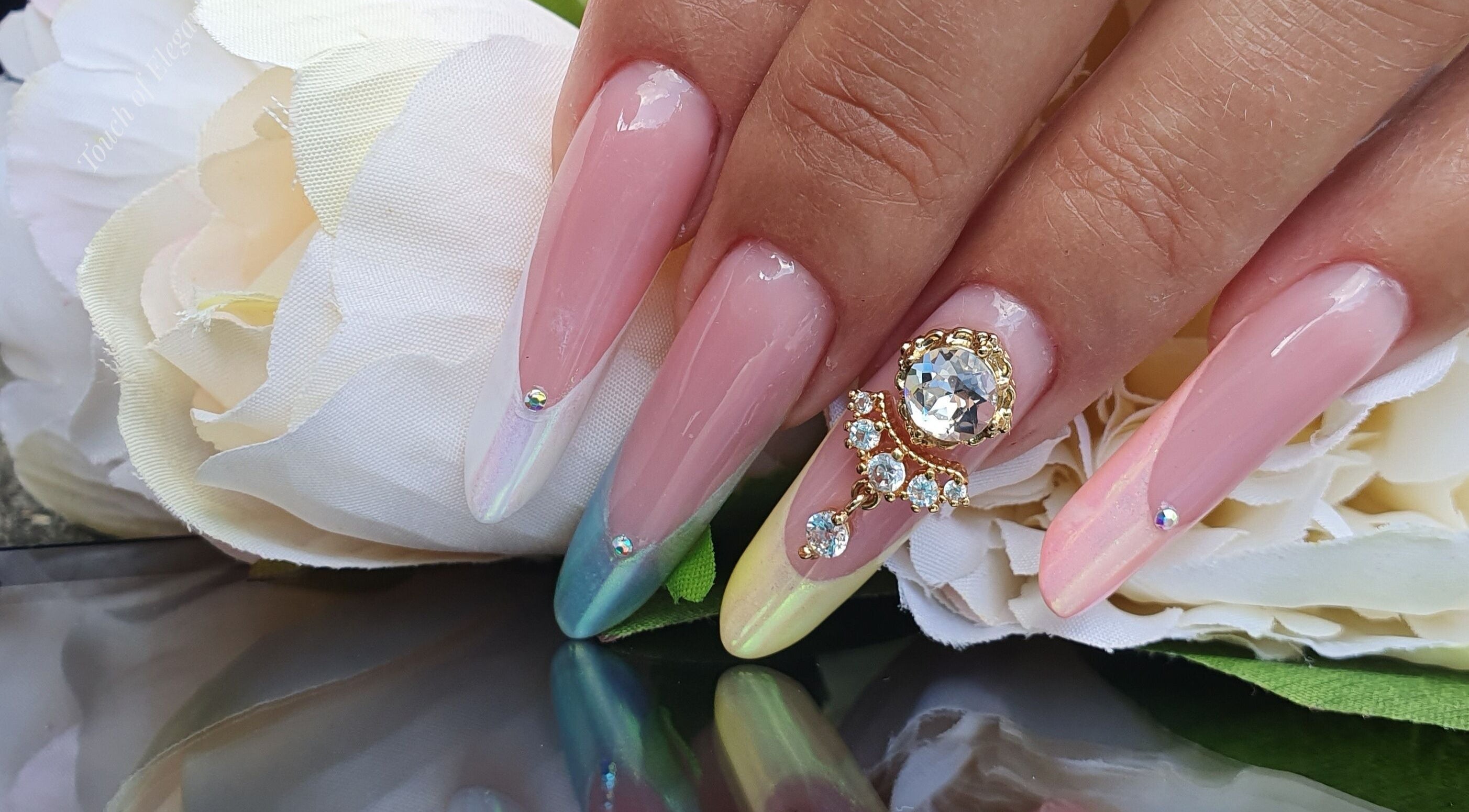Exquisite nail art with crystals at Touch of Elegance, Colchester, England, GB. Perfect for a sophisticated look.