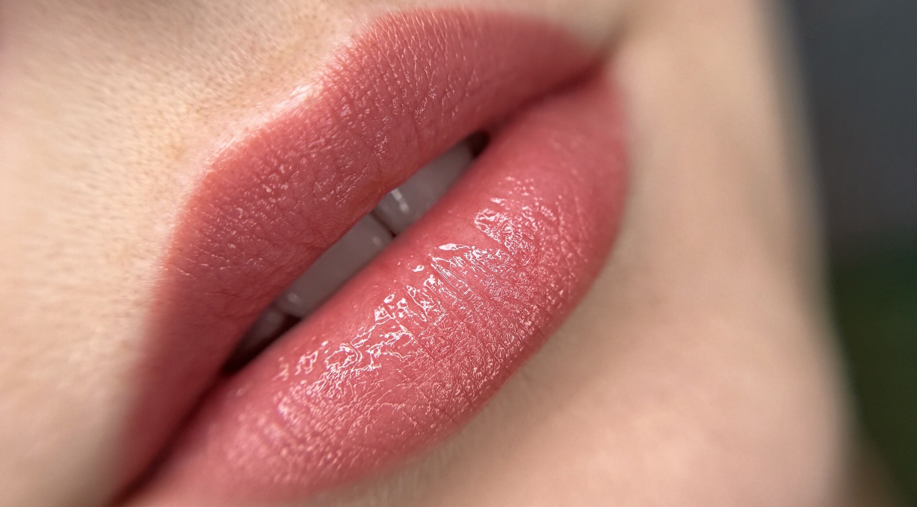 Close-up of glossy lips at Touch of Elegance, Colchester, England, GB.