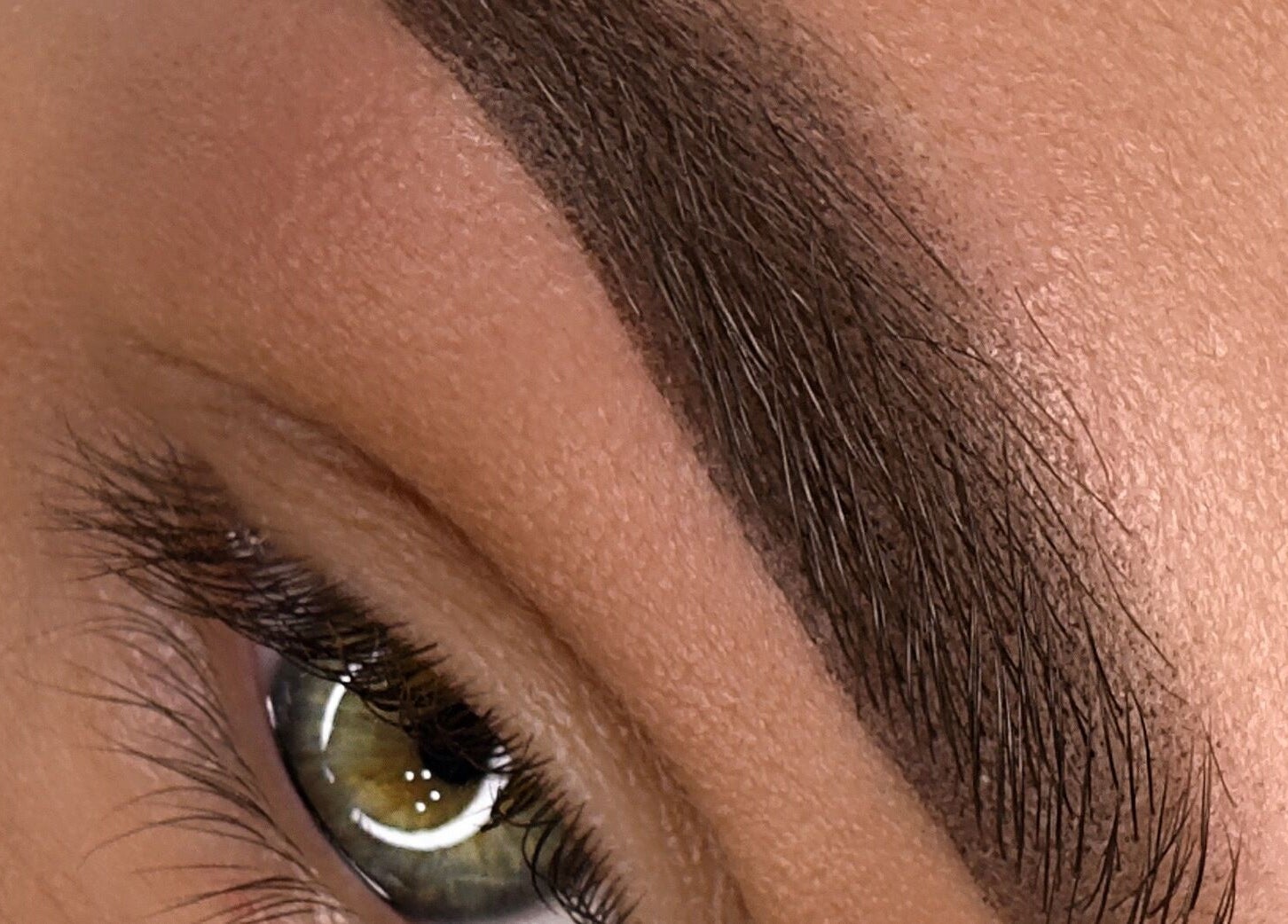 Expert brow shaping at Touch of Elegance in Colchester, England, GB showcasing precise eyebrow styling.