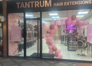 Front view of Aesthetic Beauty Clinic in Kingston Upon Thames, England, GB showcasing vibrant hair extension salon.