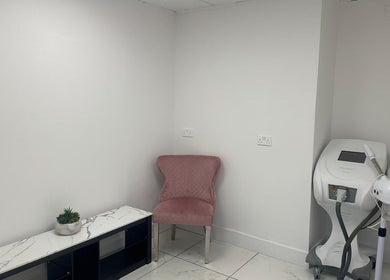 Modern treatment room at Aesthetic Beauty Clinic, Kingston Upon Thames, England, GB with sleek equipment.