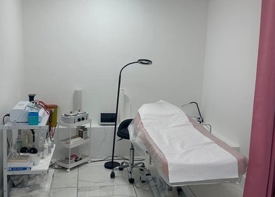 Serene treatment room at Aesthetic Beauty Clinic in Kingston Upon Thames, England, GB, featuring modern equipment.
